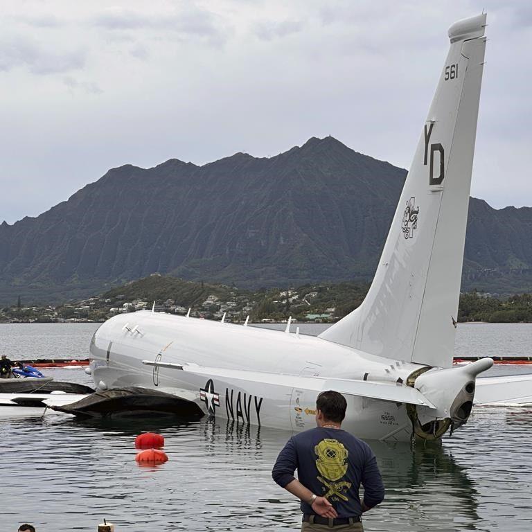 US Navy plane removed from Hawaii bay after it overshot runway. Coral damage being evaluated